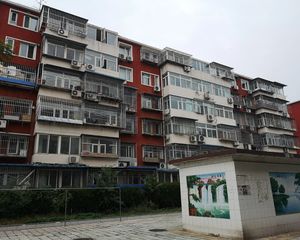 管庄西里1号楼到63号楼的房子,南北两居,商品房